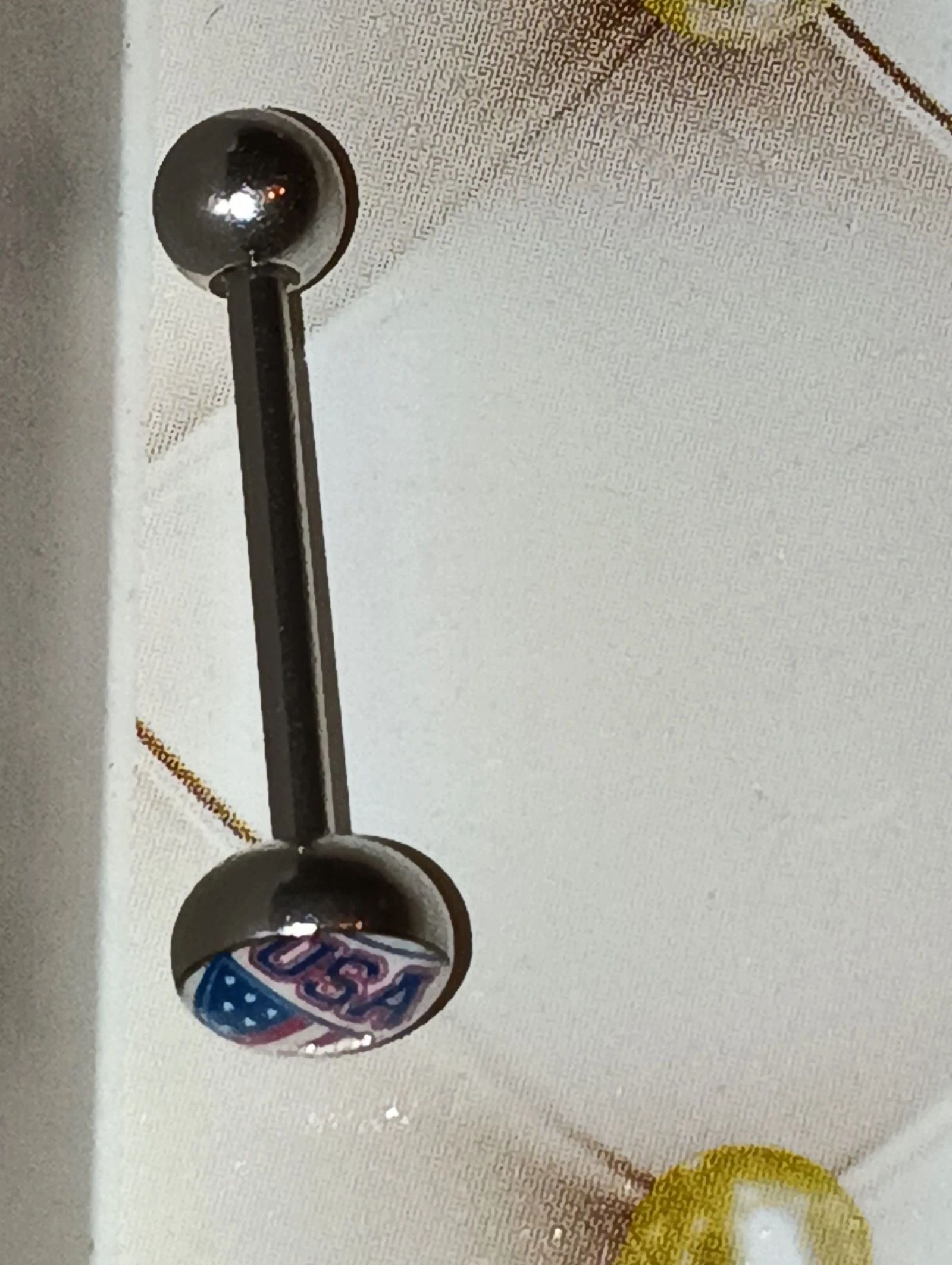 Piercing langue USA – photo 2